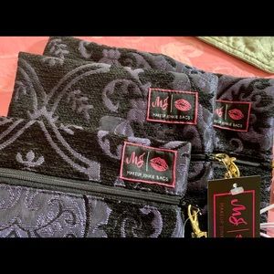 Purple quilted makeup junkie bags